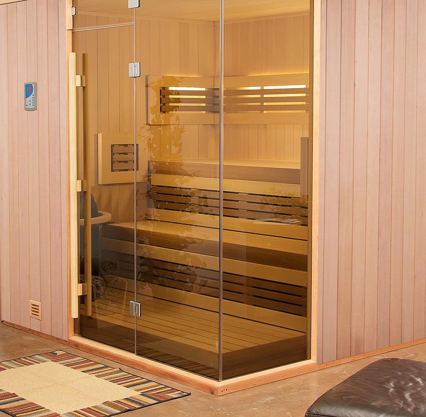 Close up of a Custom Sauna with glass door and wooden slats